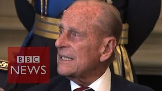 Prince Philip swears during photocall - BBC News