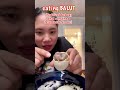 eating Balut (fertilized duck egg)