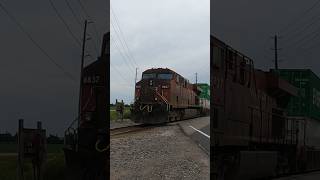 TRAIN MEET! CP 8837 leads CPKC 113 at Baxter