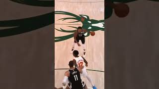 Giannis posterizes John Collins from OUTSIDE the restricted area 👀 #shorts #nba