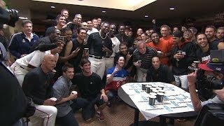 Lincecum dons mask, celebrates in clubhouse