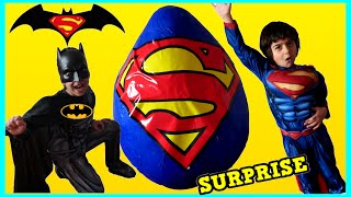 Kids open GIANT SURPRISE EGG and Pretend Play as Superman and Batman!!