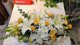 table flower arrangement white 🤍 yellow flower colour#meeting room flower arrangement official#viral