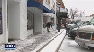 Shoveling ice and snow in West Bend | FOX6 News Milwaukee
