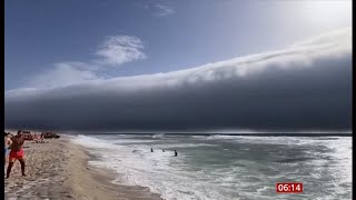 Rare ‘tsunami’ roll cloud hover over beachgoers in popular destination spot (Portugal) 1/July/2025