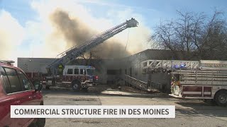 Firefighters battle structure fire at used bookstore in Des Moines