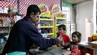 Giving Akbar gifts to small children and cleaning the shop and cleaning his room