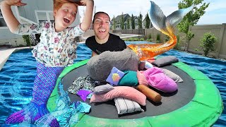 Mermaid PiLLOW FiGHT!!  Adley vs Dad magic trampoline battle with a Giant LoveSac in the Backyard!
