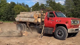 Unloading at the mill…and hung up logs! #060