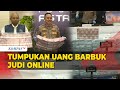 Tumpukan Uang Barbuk Pengungkapan Kasus Judi Online di Indonesia