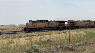 PRB 33:  UP 5953 North NPPX (NSPX?) Coal races UP 5259 North ETRX Coal with hornshow.  (300th video)