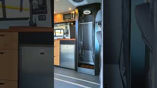 The Calamity Jane Camper Van featuring a Shower and Skylight by Off Highway Van