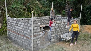 Lieu together with the workers, building a solid wall for Mr. Cha house (15m2).