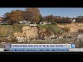 Erosion slowed, homeowner credits boulders