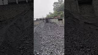 The process of unloading coal from a small coal train