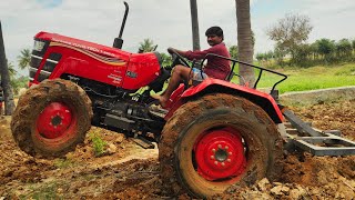 Mahindra yuvo tech plus 585 di 4wd tractor goes to 5 point cultivator performance in mudland