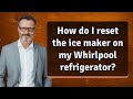 How do I reset the ice maker on my Whirlpool refrigerator?