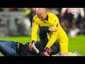 sevilla goalkeeper marko dmitrovic attacked by pitch invader at psv