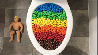 Will it Flush? - Rainbow M&M's and Stretch Armstrong