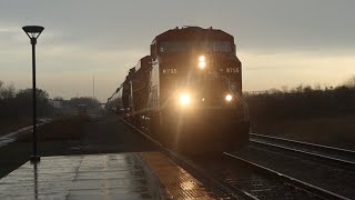 CP 8755 leads CP 287 with very loud thunder in the beginning at Amtrak station Milwaukee