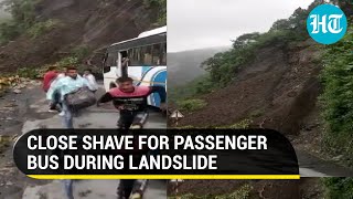 Watch: Bus narrowly escapes accident due to rain-triggered landslide in Nainital