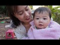 full video the daily life of a beautiful poor single mother. breastfeeding