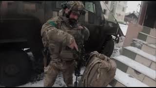 Ukraine - 04.02.2023. Georgian Legion Fighters In Bakhmut. Heavy Shelling Is Heard In The Background