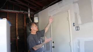 How to drywall around a door?