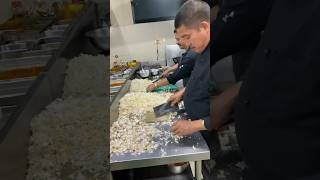 A 60 year old Nepali chef chop garlic in bulk very hardworking 😱#hardwork #chef #cooking #viral