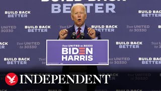 Biden suggests QAnon supporters seek mental health services