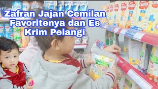 Zafran ngelilingin alfamidi beli promina puff dan Es Krim Walls Rainbow