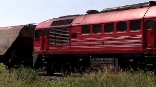 H-Start 628 (M62) - 224 on a freight train in Aba