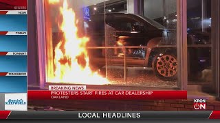 Protesters start fires at Oakland car dealership