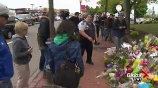 Moncton residents come together to mourn dead RCMP officers