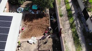 Tilling in compost before planting grass