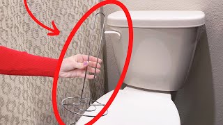 Stick a paper towel holder on your toilet (BRILLIANT!)