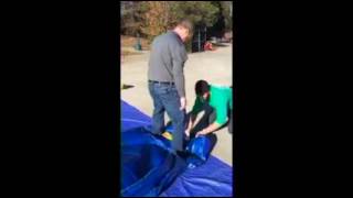 How to deflate and roll a bounce house