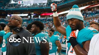 NFL players take a knee, raise fists during national anthem