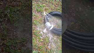 Sewer jetter hose with nozzle in full action