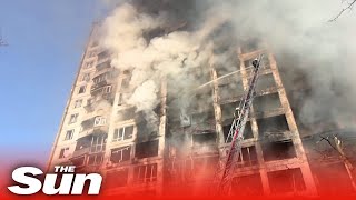 Firefighters battle blaze at apartments in Kyiv, Ukraine as at least two civilians die
