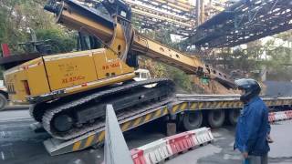 How excavator load on a trailer