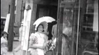 1930s film clip of parasol girls walking in the Ginza