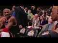 Michael Jordan and Dennis Rodman talking strategy on the bench