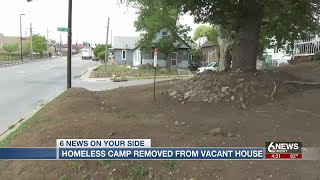 Homeless camp removed from vacant South Omaha home