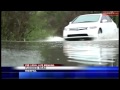 Firefighters pull people to safety after cars left stranded on flooded roads