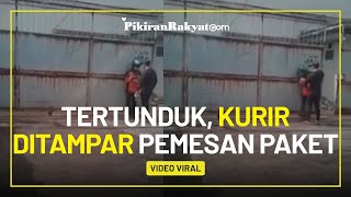 Hanya Tertunduk, Viral Seorang Kurir yang Ditampar oleh Diduga Penerima Paket di Depan Gerbang