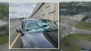 Close call! Steel beam comes crashing into moving car, narrowly missing man