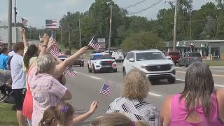 Procession brings fallen Hillsdale deputy to funeral home, as community members honor his life