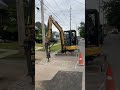 cat 304 excavator with cat b6 hammer jackhammering asphalt