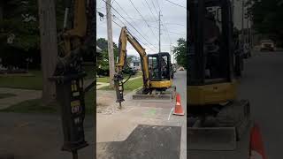 CAT 304 Excavator with CAT B6 Hammer Jackhammering Asphalt